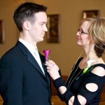 Calgary Wedding Photographer | Groom getting flowers pinned on my mom