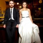 Calgary Wedding Photographer | Bride and Groom on bar | Formals downtown Calgary | James Joice Irish pub |