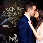 Calgary Wedding Photographer | Bride and Groom in alley with spray paint