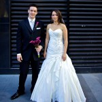 Calgary Wedding Photographer | Bride and Groom with black background in alley