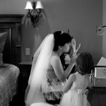 Calgary wedding photographer | Drumheller Wedding | Farm yard | Bride getting ready with flower girl watching