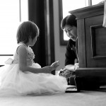 Calgary wedding photographer | Drumheller Wedding | Flower girl sitting on the floor with grandma