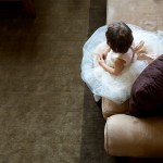 Calgary wedding photographer | Drumheller Wedding | Flower girl sitting on couch top view