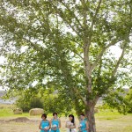 Calgary wedding photographer | Drumheller Wedding | Farm yard | Bride and bridesmaids under large tree